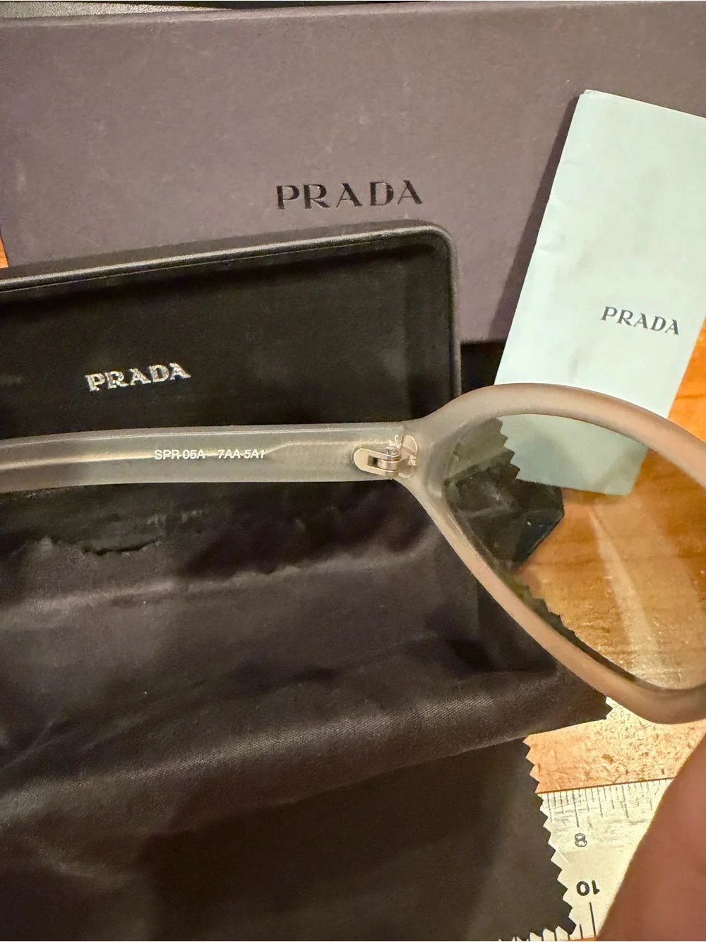 Prada Kids Oval Sunglasses in Light Gray with Dark Lenses